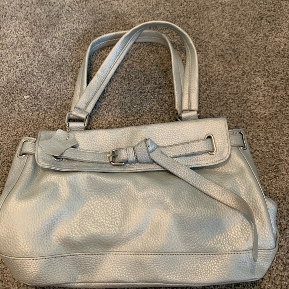 NEVER BEEN USED SILVER PURSE